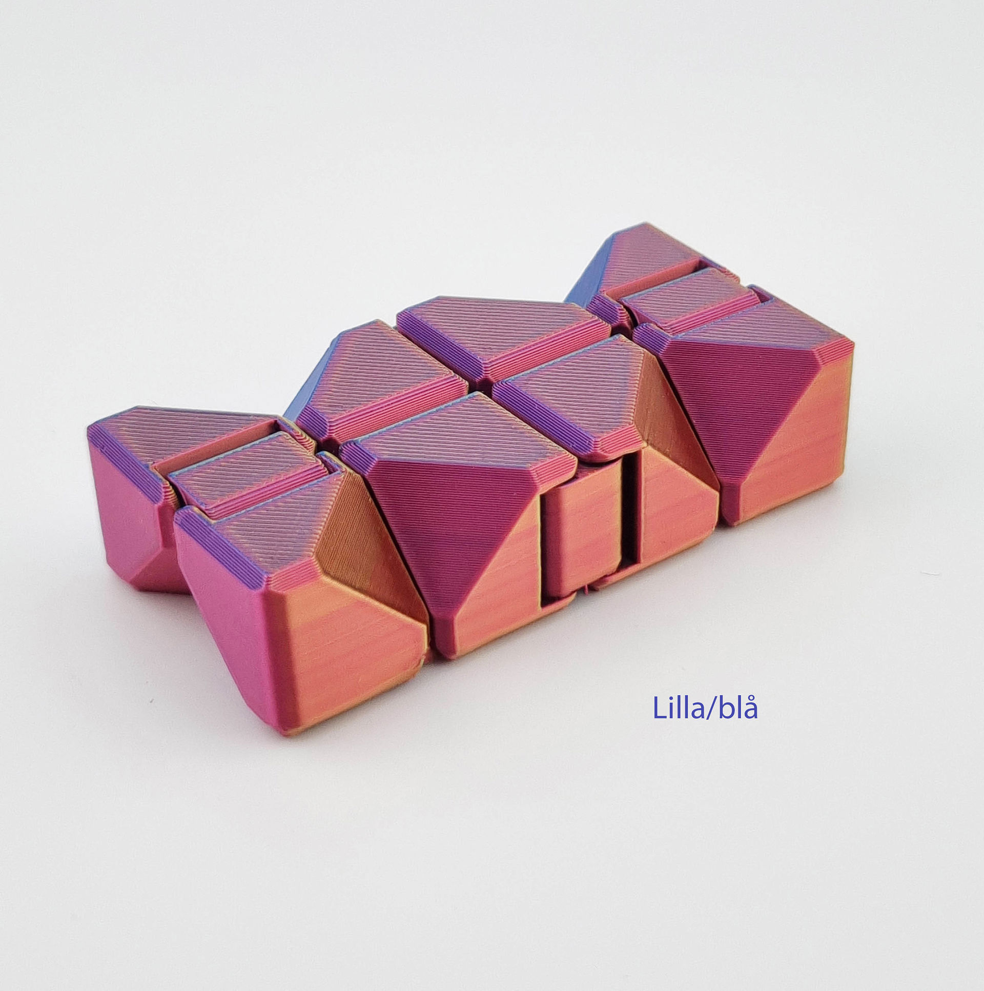 Lilla/blå 3D-printet fidget cube med sammenhængende, foldbare kuber.